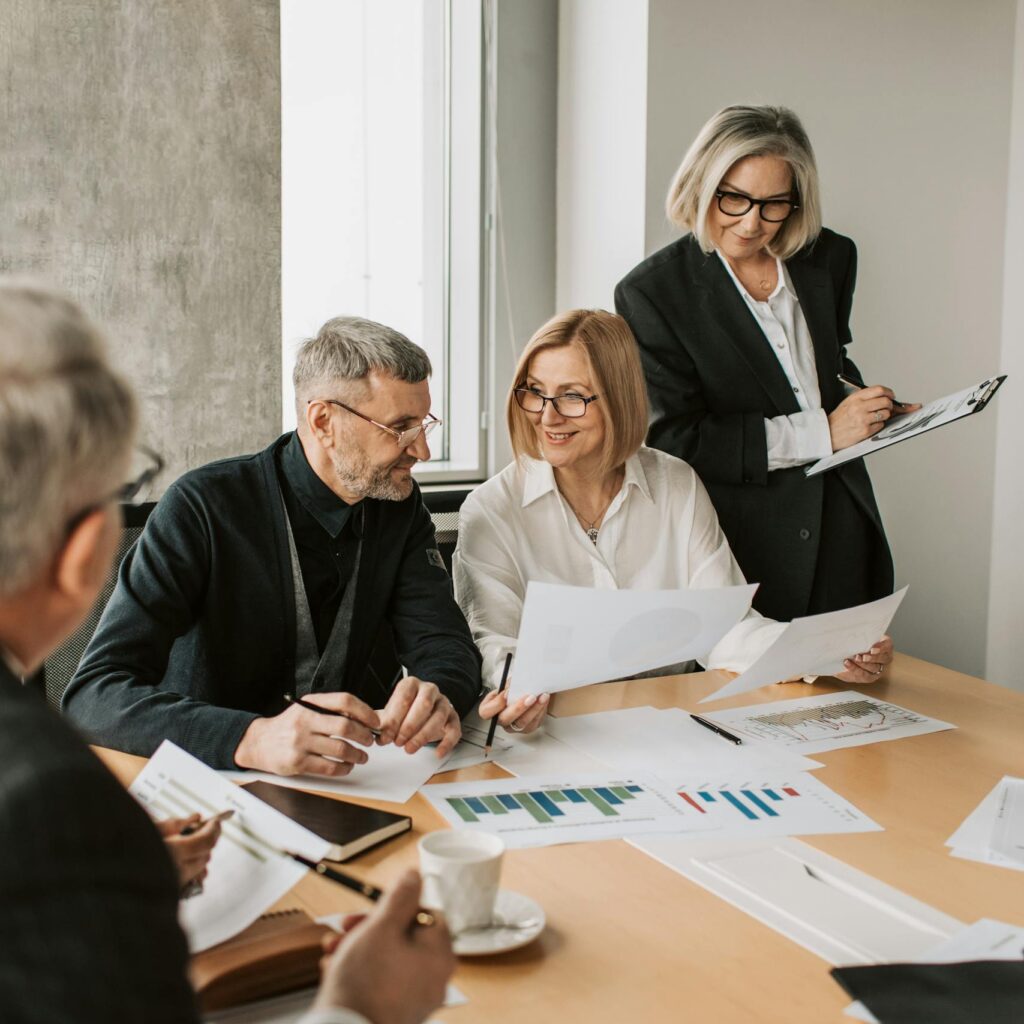 A group of business professionals engaged in a strategic meeting.